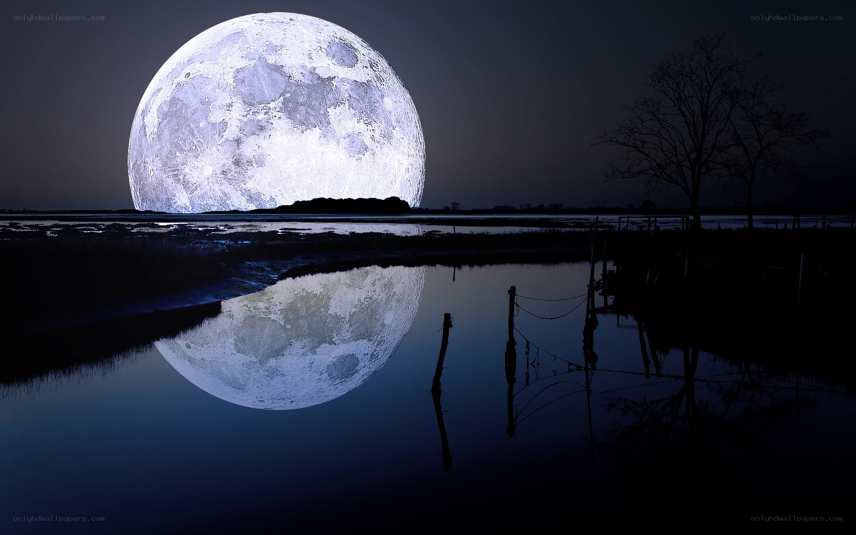 Large moon over water