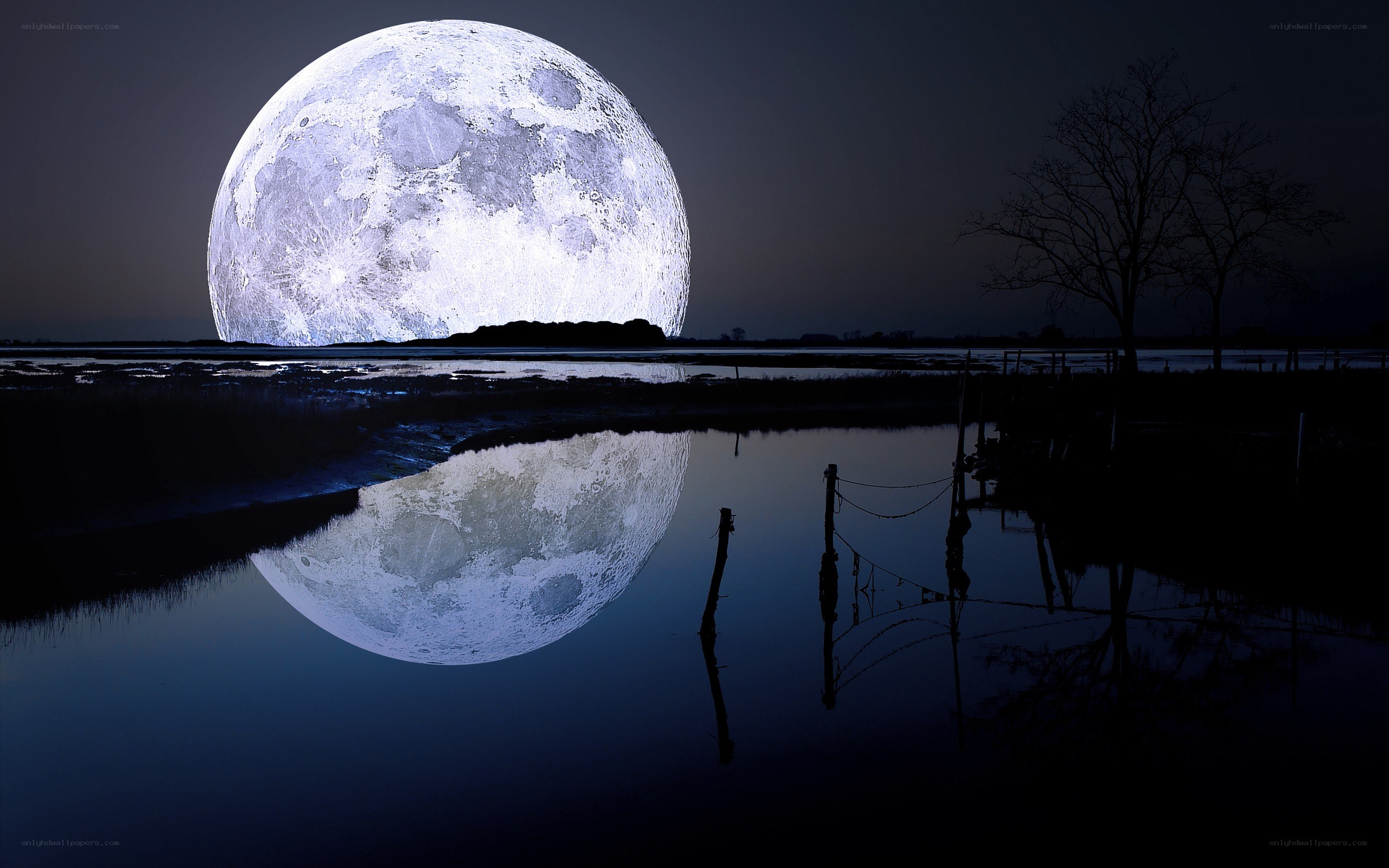 Large moon over water