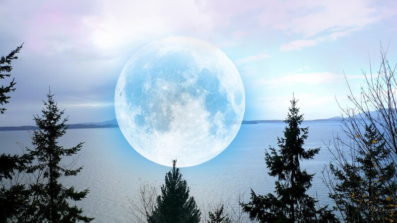 Large moon over water