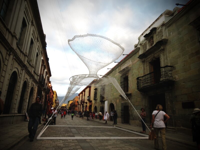 Large net sculpture in city street