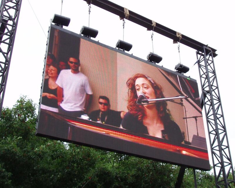 Large outdoor screen showing a performance