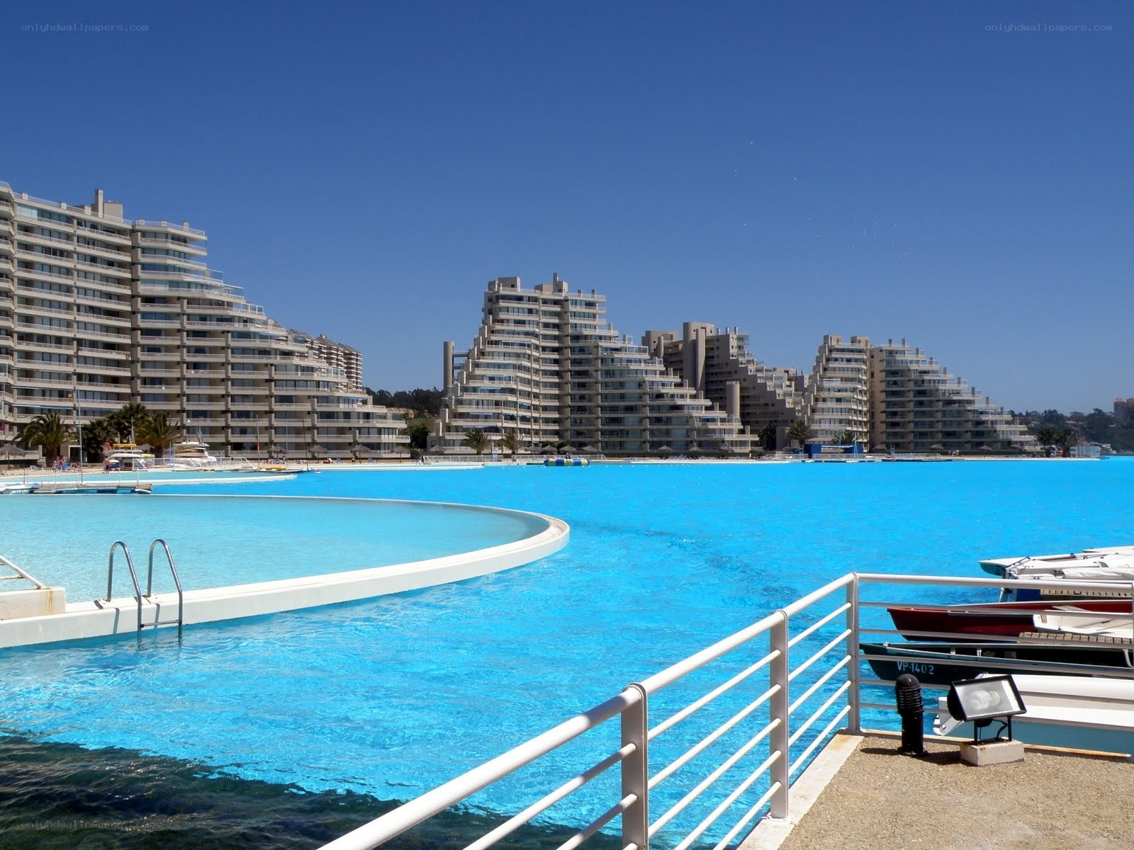Large pool with city skyline