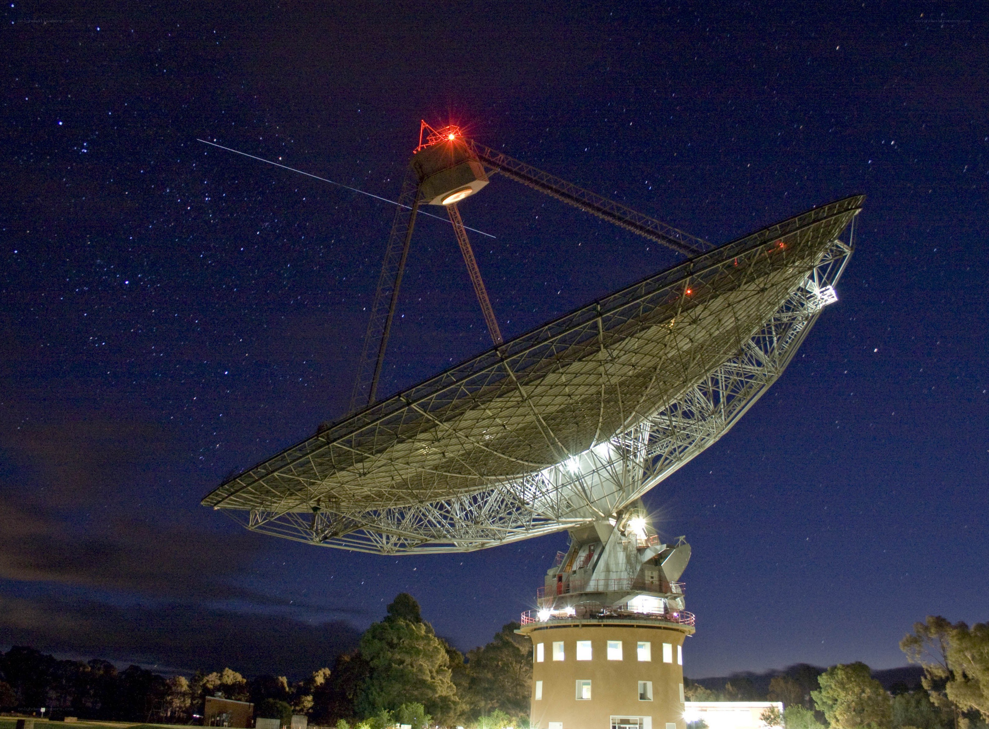 Large radio telescope at night