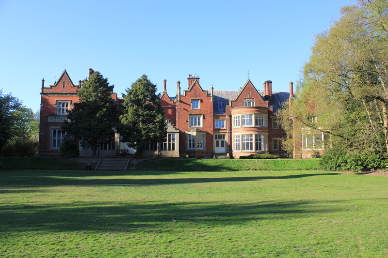 Large Red Brick Building — Green