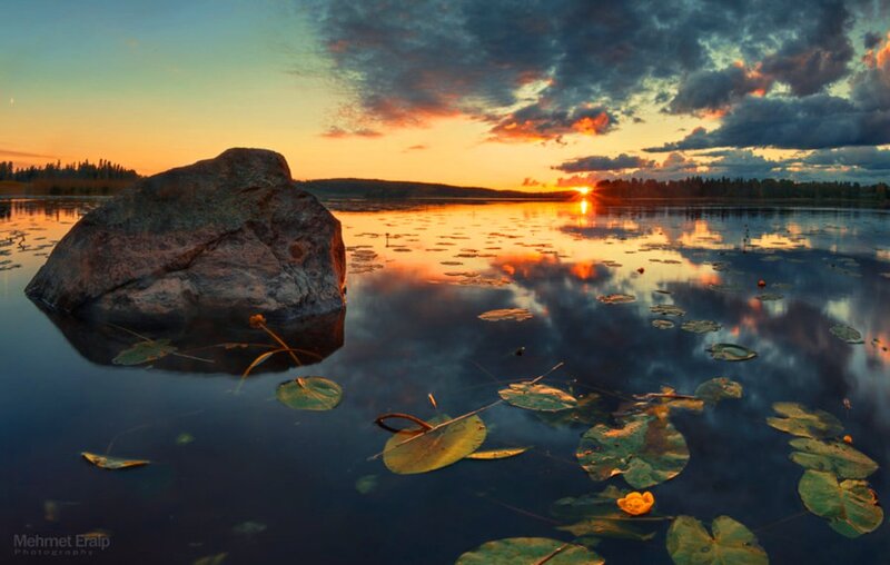 Large Rock in Lake — Orange, Serene