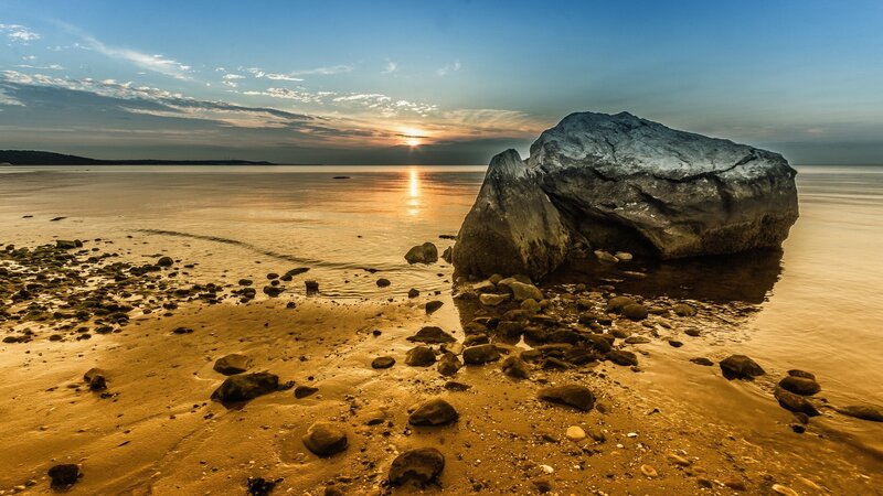 Large Rock on Beach — Blue, Serene, Sunset, Photograph, Sand, Sea