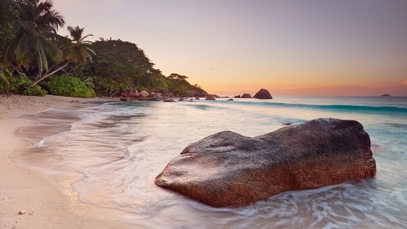 Large Rock on Beach — Orange, Serene