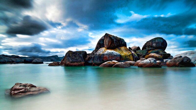 Large Rocks in Calm Water — Blue