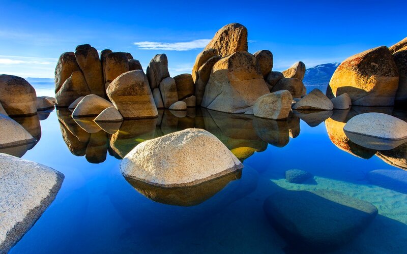 Large Rocks in Lake — Blue, Serene, Afternoon, Photograph, Sky