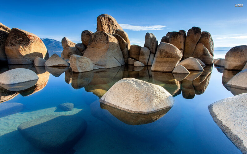 Large Rocks in Lake — Blue, Serene