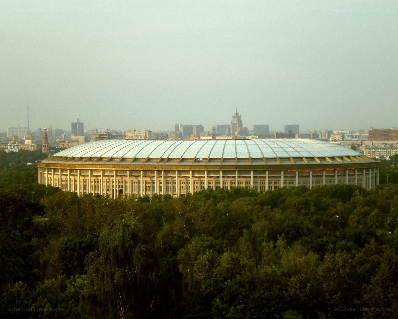 Large stadium in cityscape