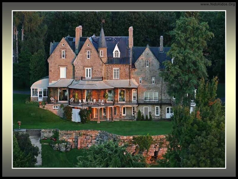 large stone house with garden