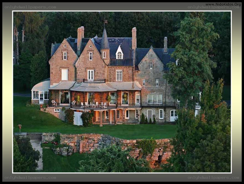 large stone house with garden