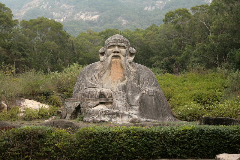 Large stone statue of a sage