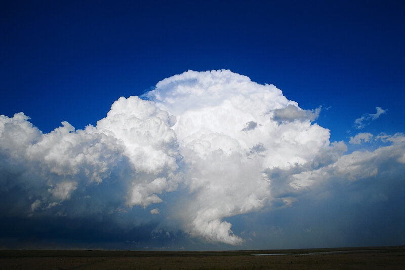 Large storm cloud over plains