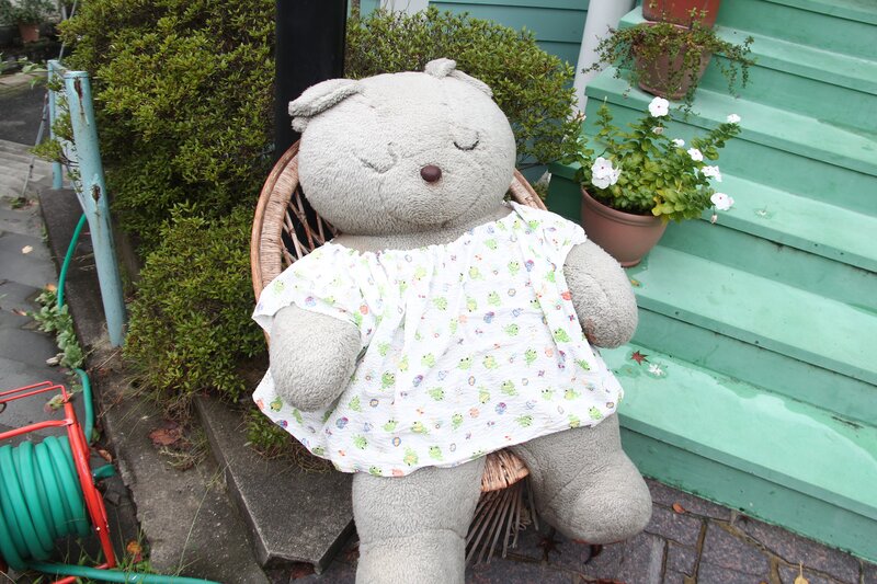 Large teddy bear in dress