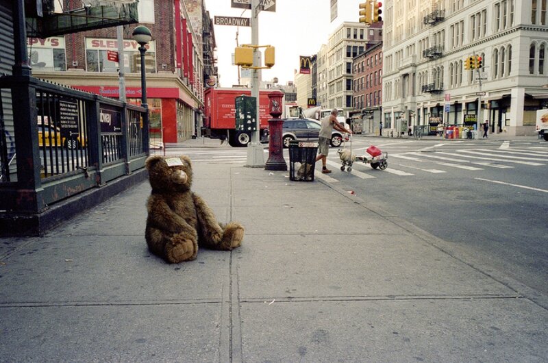 Large Teddy Bear on Sidewalk