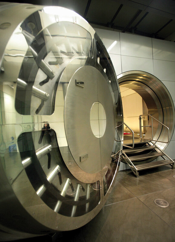 Large vault door in a secure facility