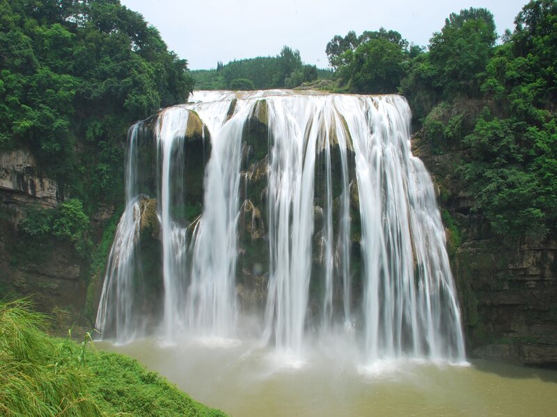 large waterfall in forest
