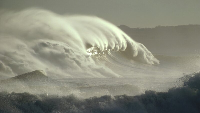 Large wave crashing on shore