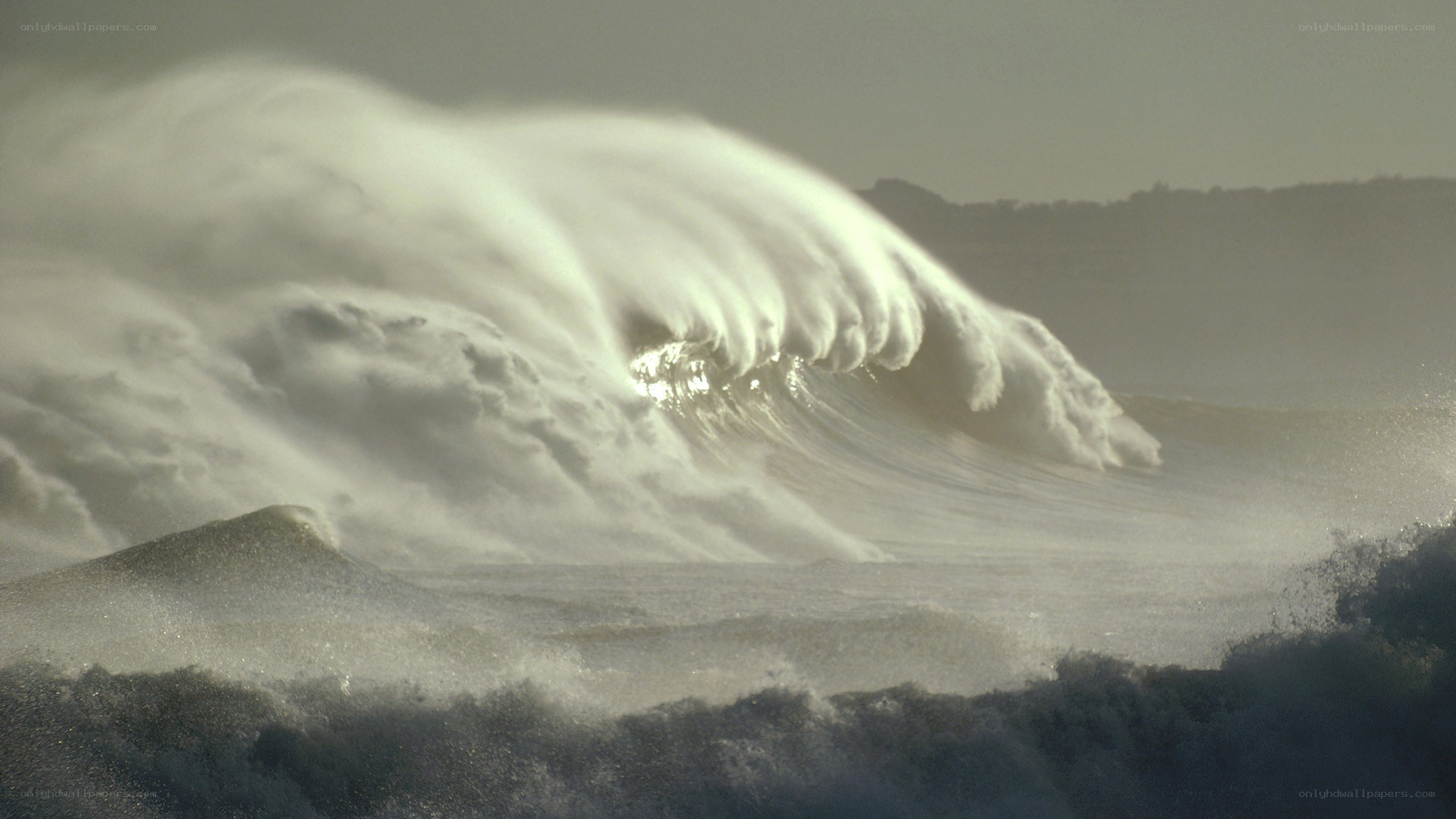 Large wave crashing on shore