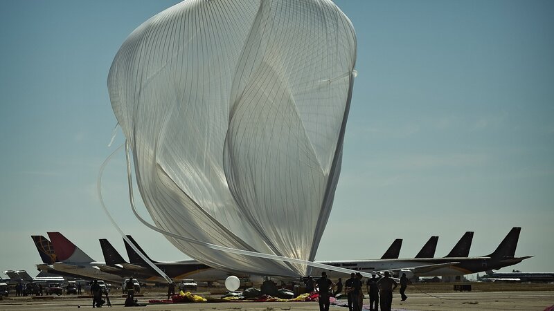 Large White Balloon on Tarmac