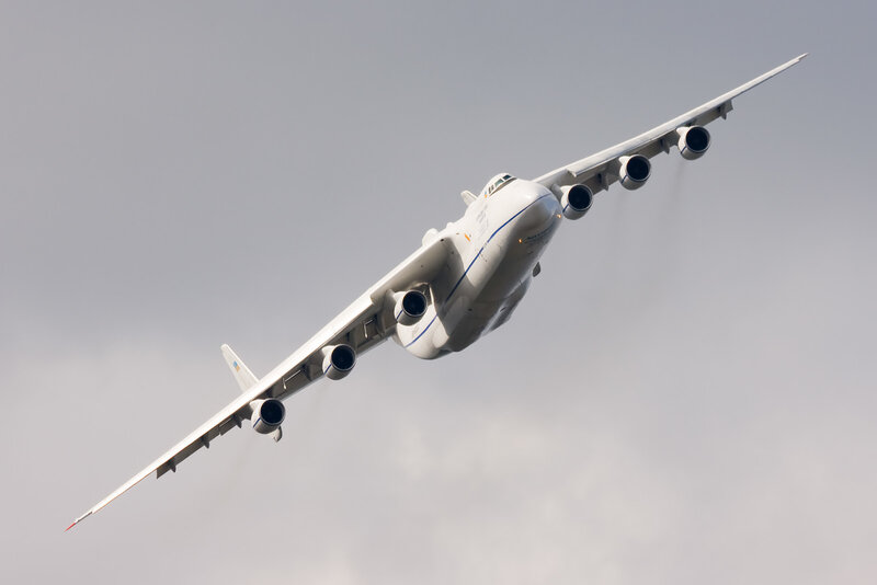 Large white cargo plane in flight