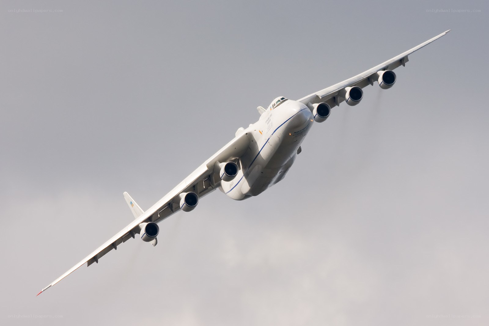Large white cargo plane in flight
