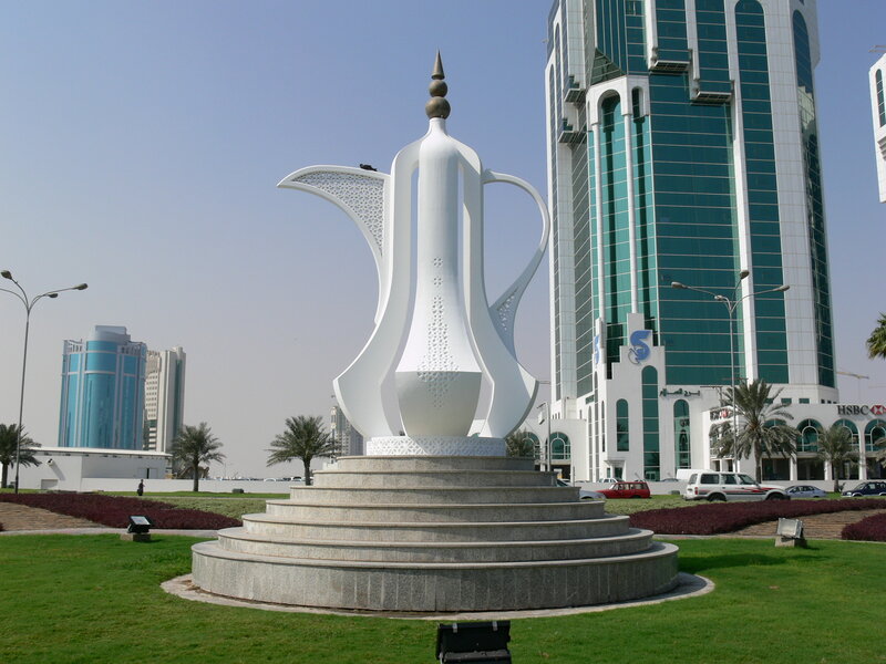 Large white coffee pot sculpture