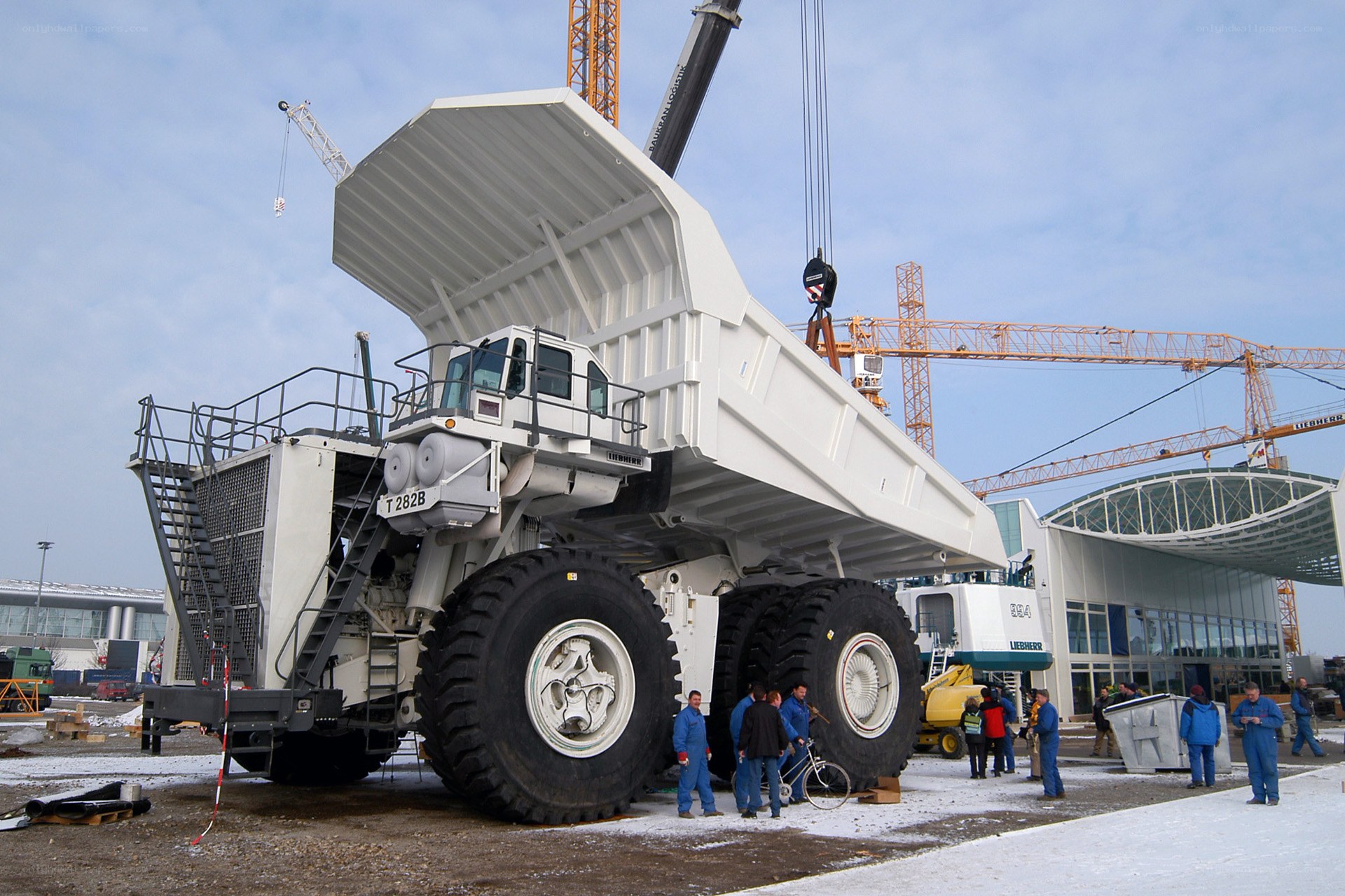 Large white mining truck on display