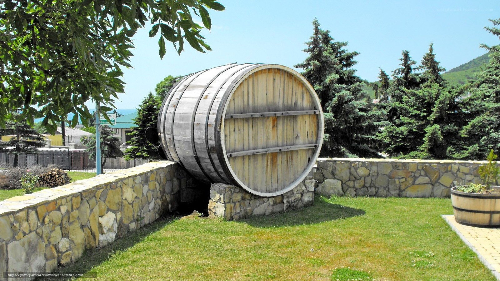 Large wooden barrel in garden