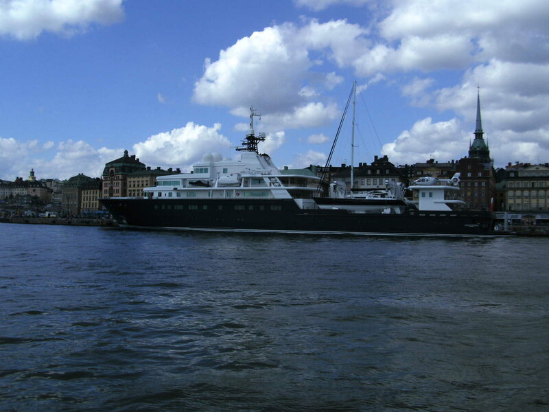 Large yacht in a city harbor