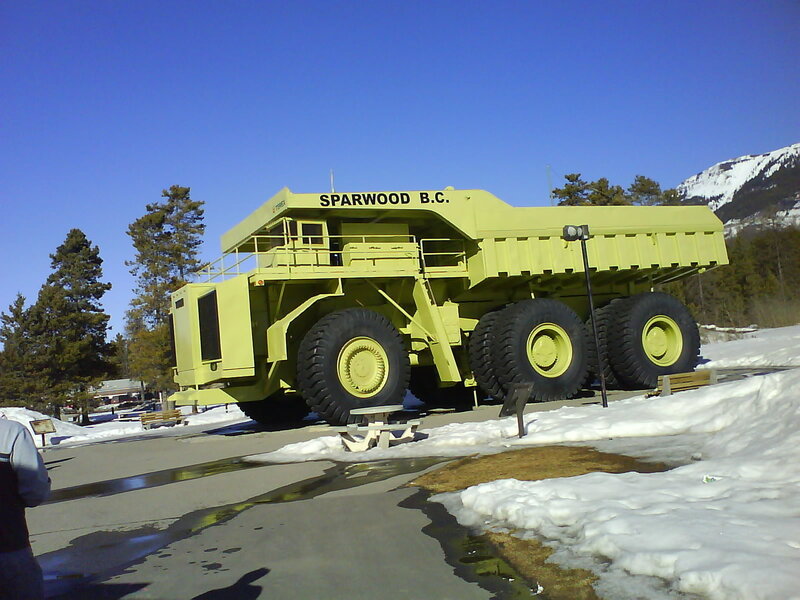 Large yellow mining truck display