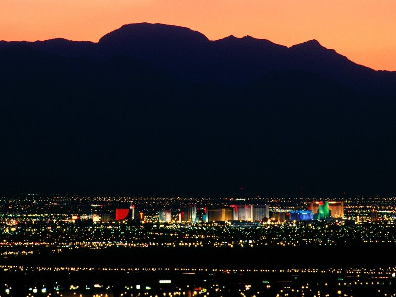 Las Vegas at dusk with mountains