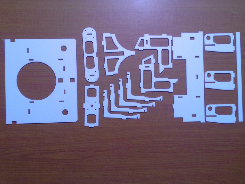 laser-cut parts on wood