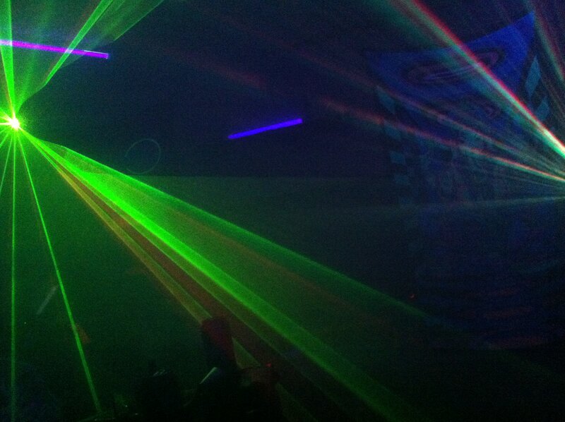 Laser Lights in Dark Room — Green