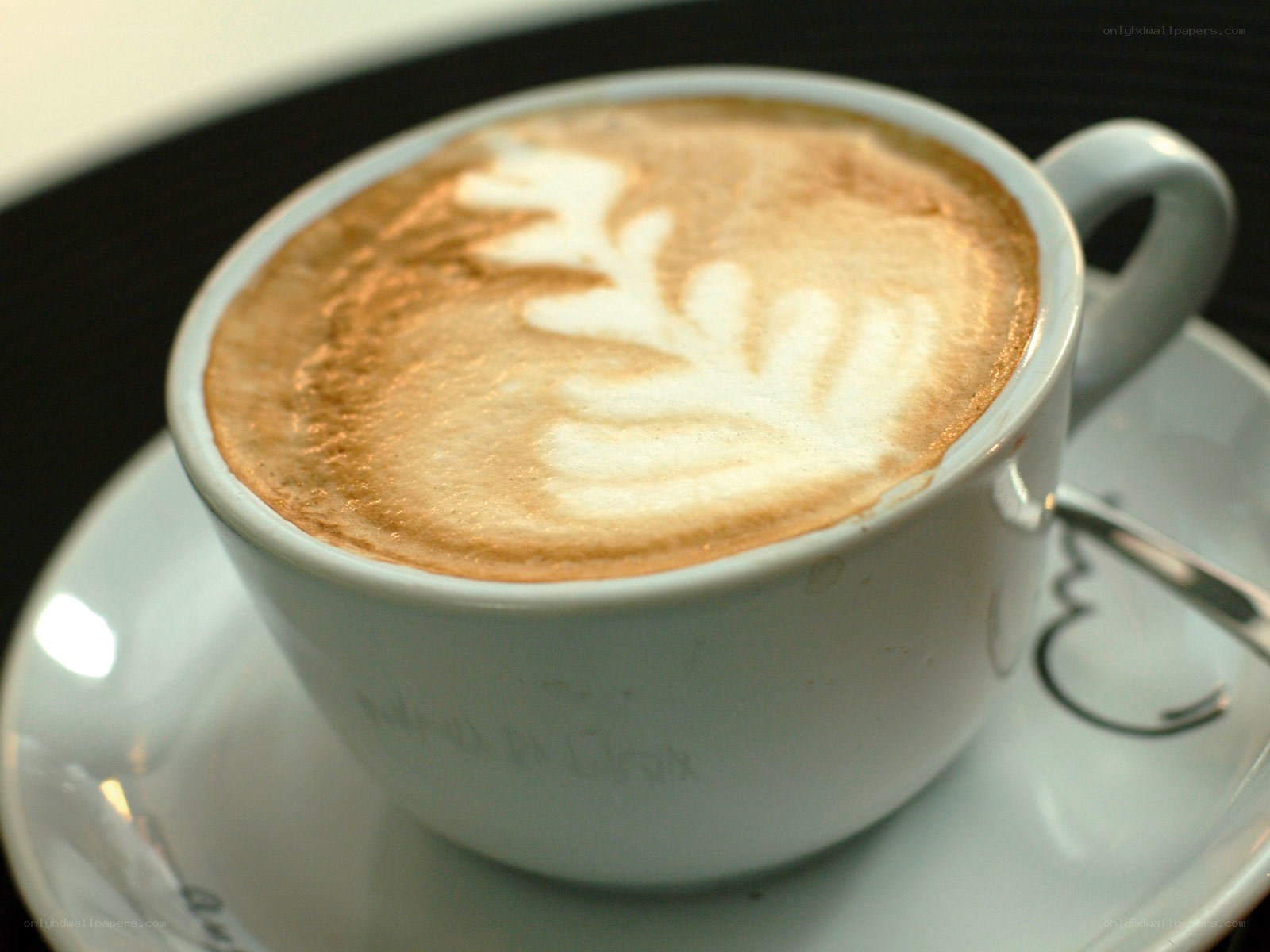 Latte art in a white cup