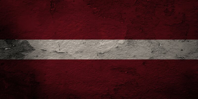 Latvia flag on textured wall