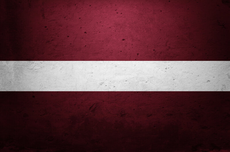Latvia flag on textured wall