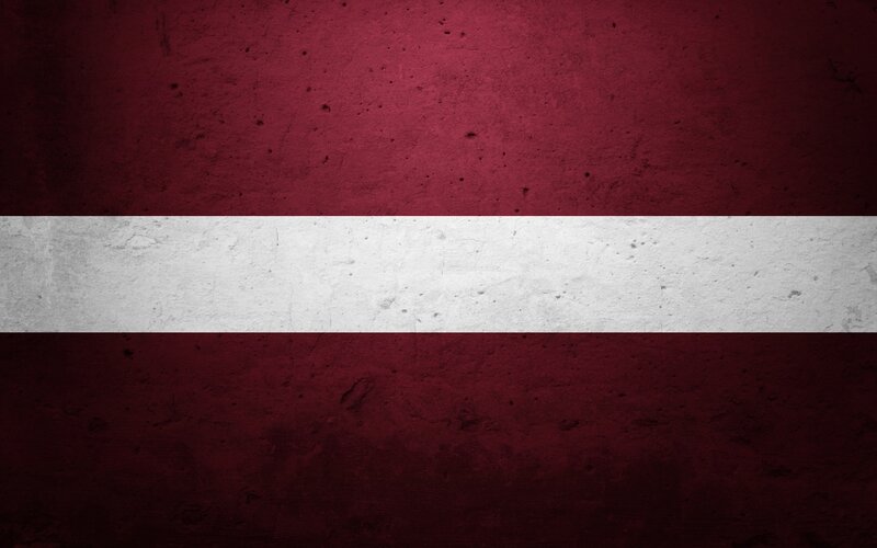 Latvia flag on textured wall