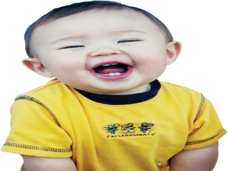 Laughing Baby in Yellow Shirt