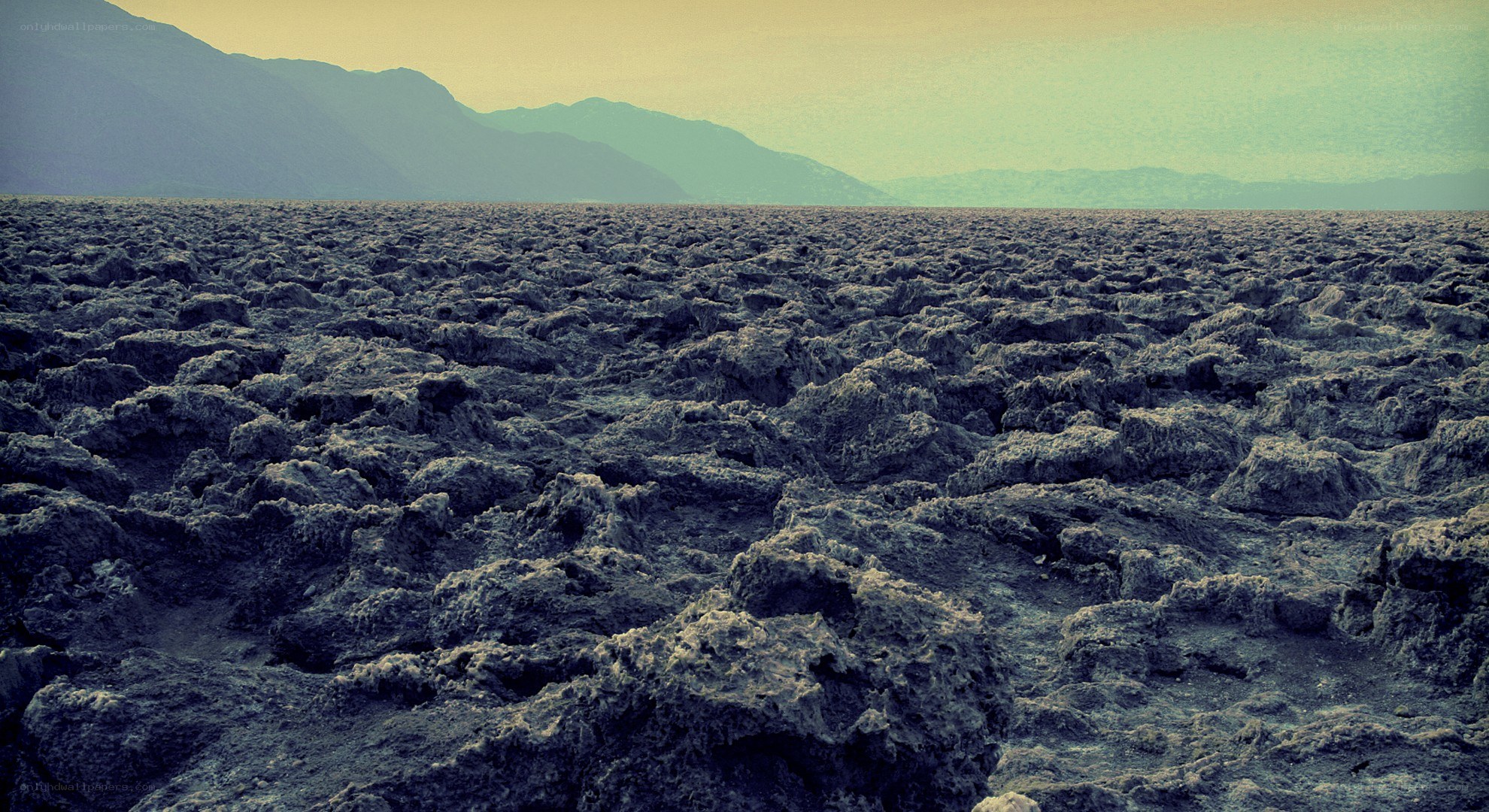 Lava field under hazy sky