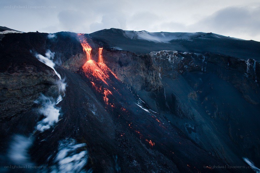 Lava flow from erupting volcano