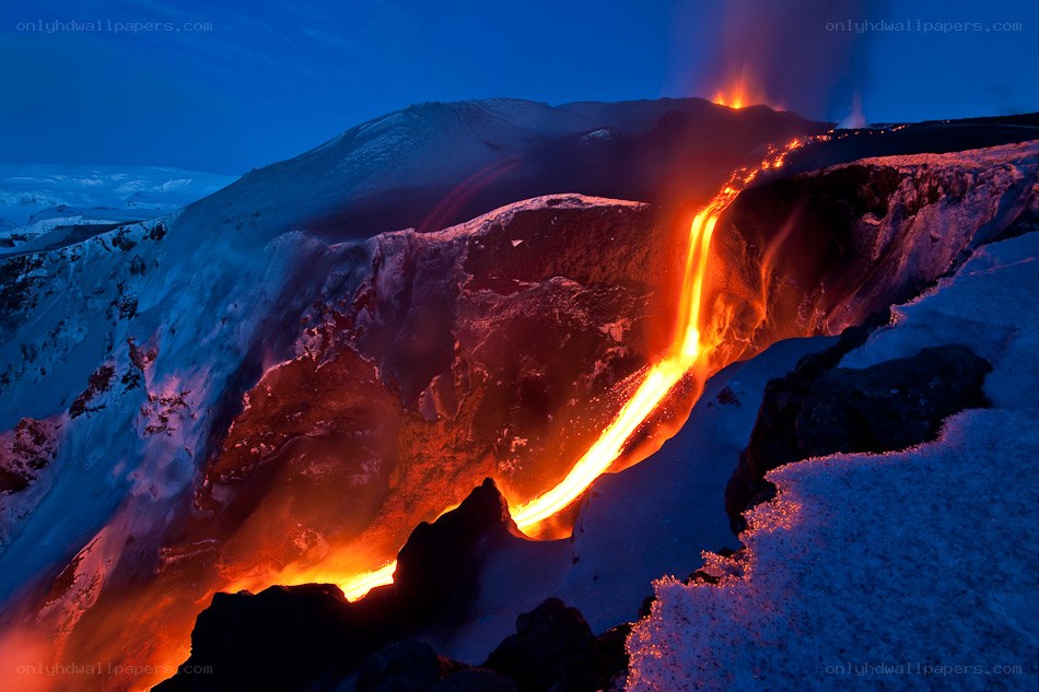 Lava flow on snowy mountain