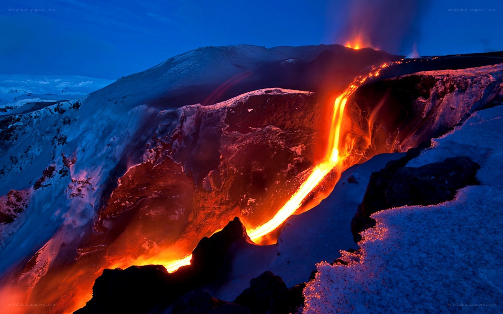 Lava flow on snowy mountain