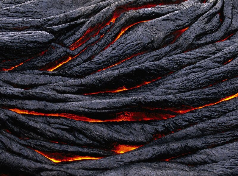 Lava flow with glowing cracks