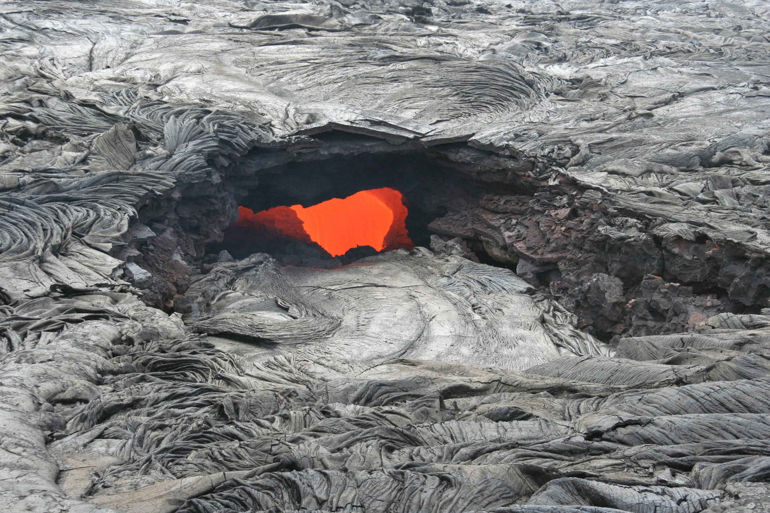 lava flow with glowing vent