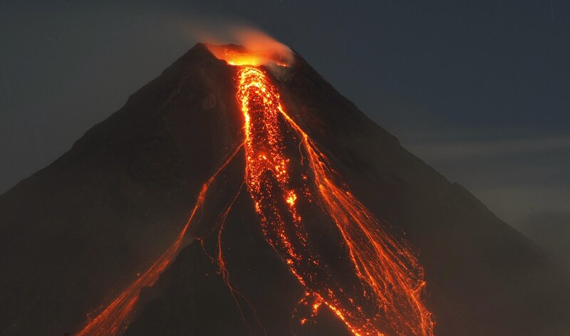 Lava Flowing Down Volcano — Orange