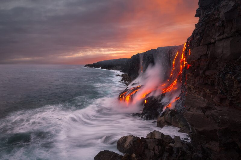 Lava Flowing into Ocean — Orange, Dramatic, Sunset, Photograph, Cliffs