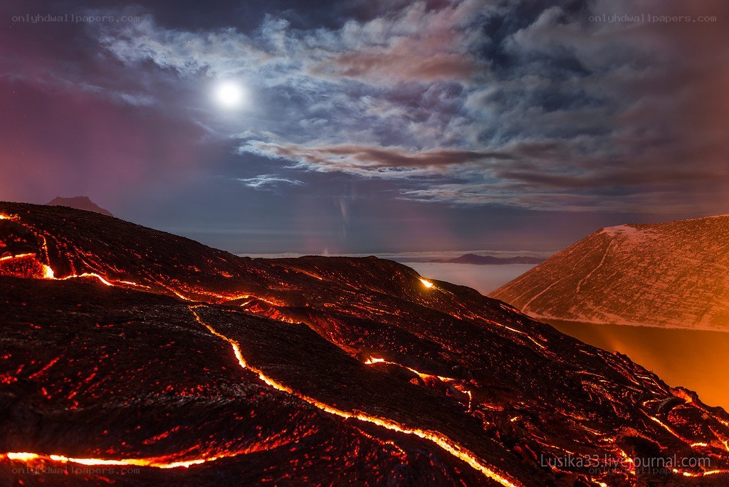 Lava flows under moonlight